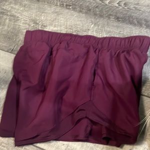 A L magenta shorts in women.
